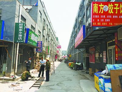 “公寓”大院重回唐家岭 一栋自建楼住进600户